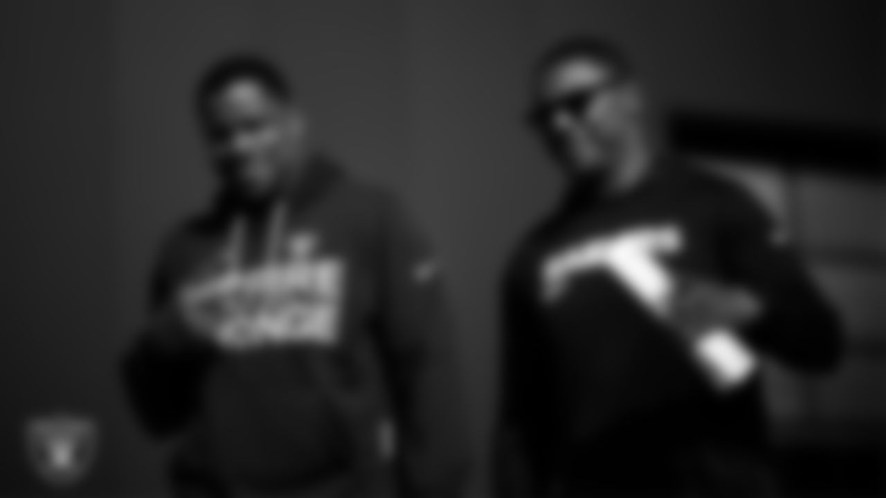 Las Vegas Raiders defensive assistant/linebackers coach Ty McKenzie and running backs coach Deland McCullough during practice at Intermountain Health Performance Center.