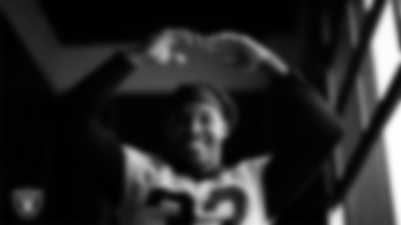 Las Vegas Raiders safety Lonnie Johnson Jr. (32) walks out to the field for practice at Intermountain Health Performance Center.