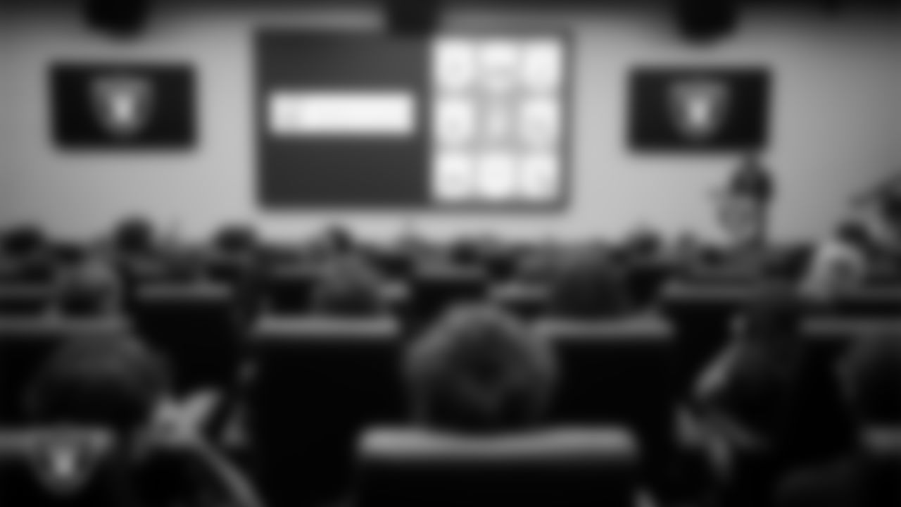 Las Vegas Raiders editor-in-chief of historical content Mike Taylor talks with students about Raiders history at Intermountain Health Performance Center.