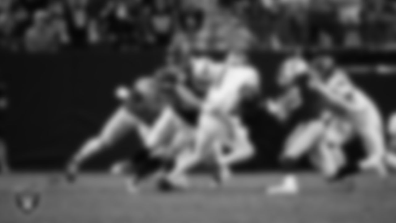 Las Vegas Raiders defensive tackle Leki Fotu (95) sacks the quarterback during the regular season home game against the Tennessee Titans at Allegiant Stadium.