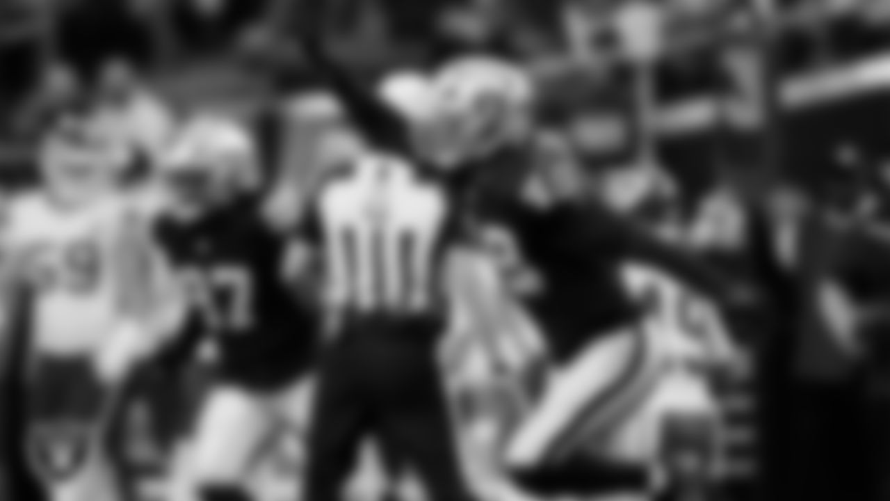 Las Vegas Raiders defensive end Charles Snowden (49) celebrates after sacking the quarterback during the regular season home game against the Kansas City Chiefs at Allegiant Stadium.