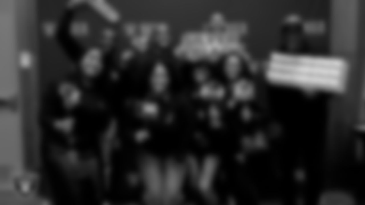 Attendees pose for a photo during the Historic Westside Tour at the West Las Vegas Library.