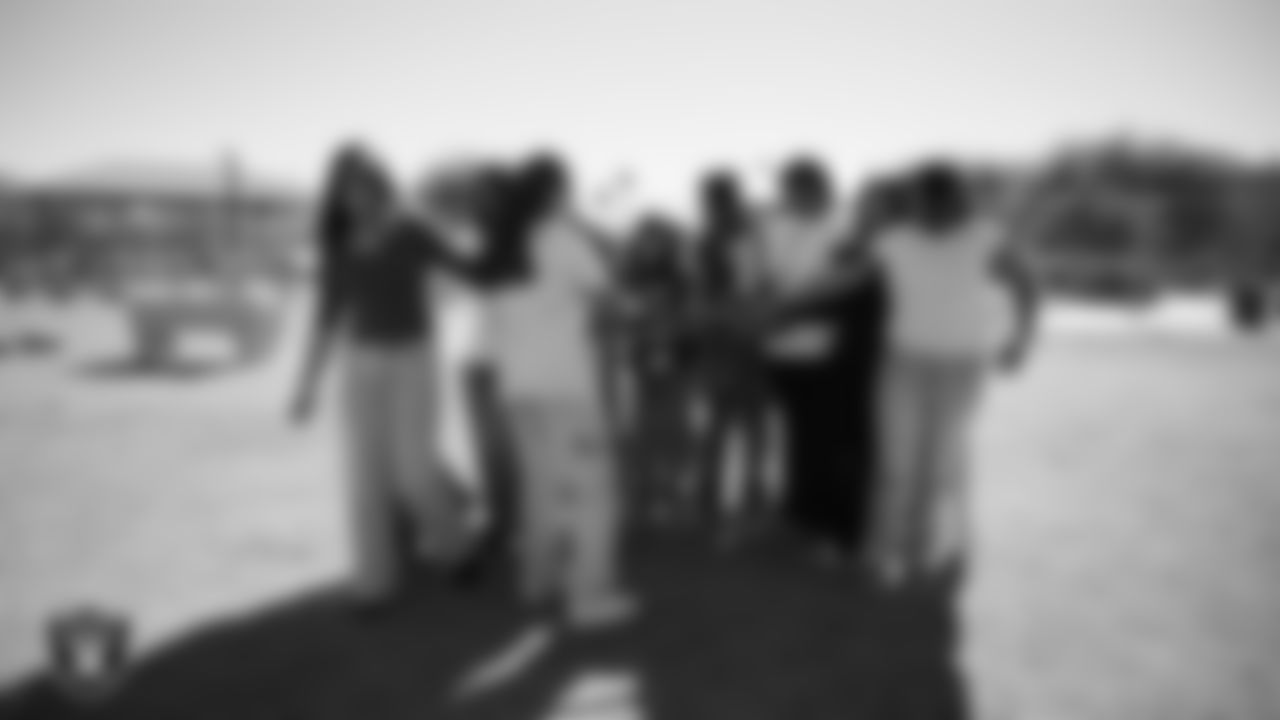 Students participate in activities while learning about flag football, nutrition and mental health during the R.U.S.H. program at J.D. Smith Middle School.