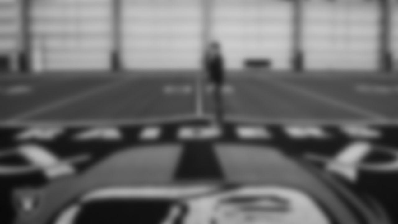 Las Vegas Raiders Head Coach Klint Kubiak on the indoor field at Intermountain Health Performance Center.