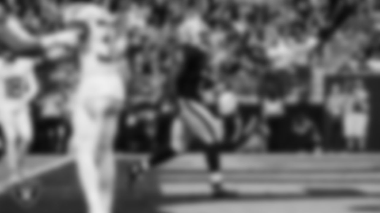 Las Vegas Raiders running back Ashton Jeanty (2) rushes for a 3-yard touchdown during the regular season home game against the Tennessee Titans at Allegiant Stadium.