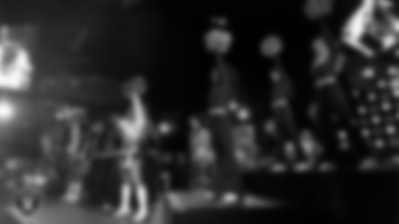 The Raiderettes perform with rapper and record producer Lil Jon during halftime at the Las Vegas Raiders regular season home game against the Los Angeles Chargers at Allegiant Stadium.