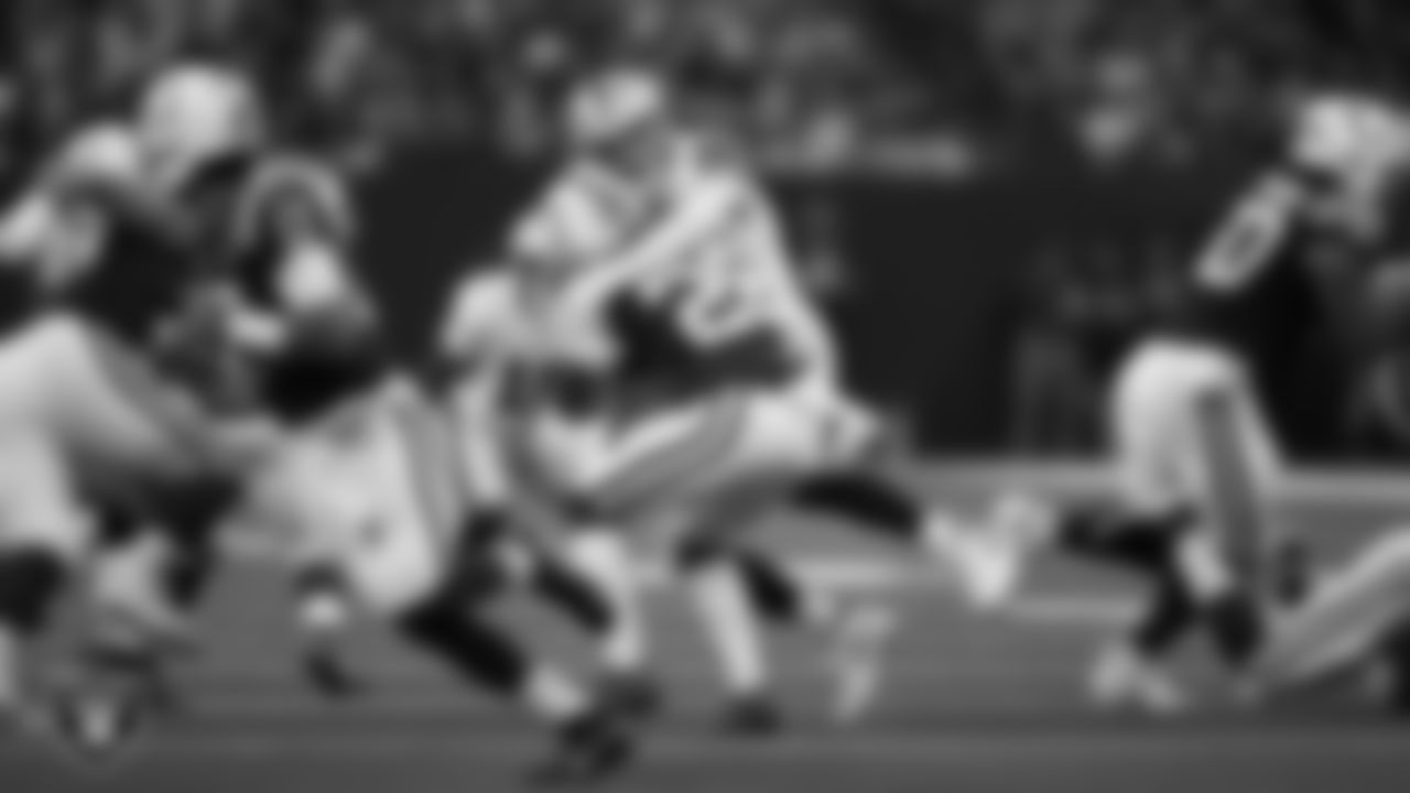Las Vegas Raiders defensive end Maxx Crosby (98) makes a tackle during the regular season away game against the Indianapolis Colts at Lucas Oil Stadium.