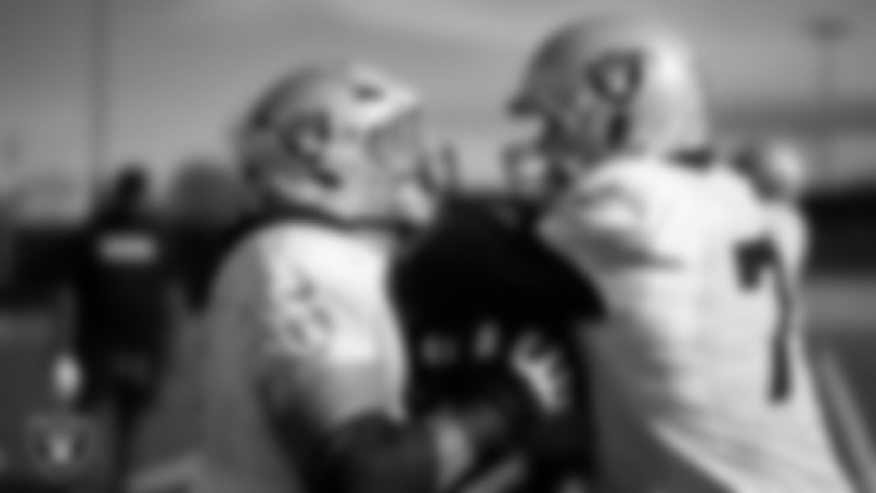 Las Vegas Raiders guard Atonio Mafi (56) and tackle Dalton Wagner (78) during practice at Intermountain Health Performance Center.