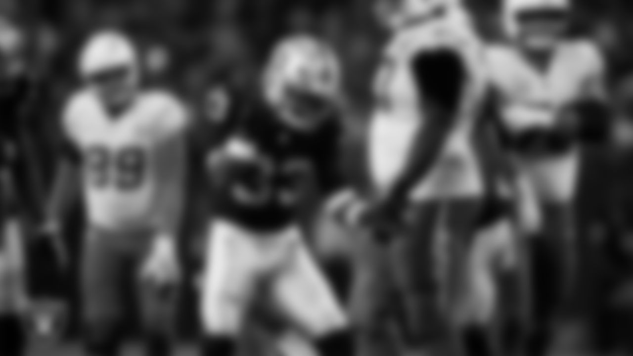 Las Vegas Raiders linebacker Jamal Adams (33) celebrates on the field during the regular season home game against the Los Angeles Chargers at Allegiant Stadium.