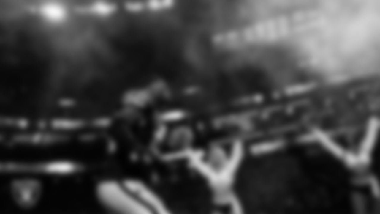 Las Vegas Raiders linebacker Elandon Roberts (52) is introduced onto the field before the regular season home game against the Los Angeles Chargers at Allegiant Stadium.