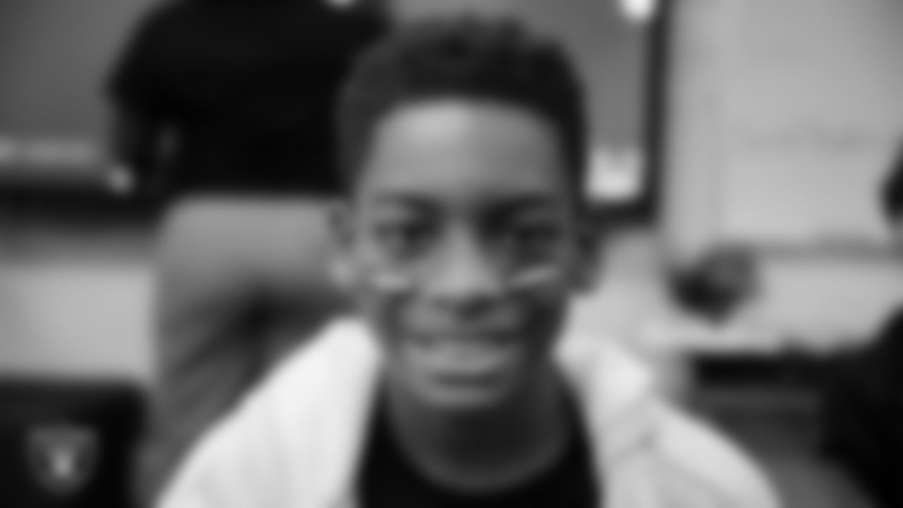 A student celebrates winning the Lil' Raiders School Challenge at Matt Kelly Elementary School.