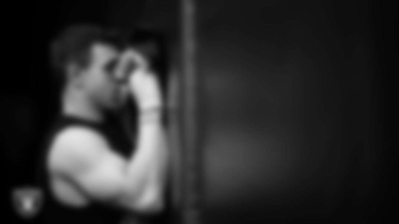 Las Vegas Raiders wide receiver Jack Bech (18) signs autographs for fans before the regular season away game against the Houston Texans at NRG Stadium.