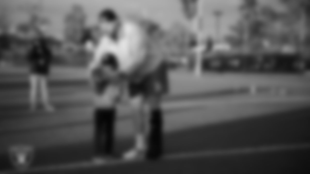 Las Vegas Raiders defensive end Maxx Crosby (98) during the "One for the Community" check presentation at Bill and Lillie Heinrich YMCA.