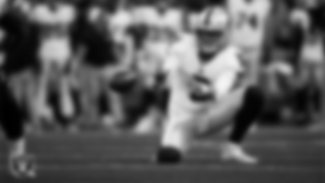 Las Vegas Raiders punter AJ Cole (6) receives the snap during the preseason away game against the Seattle Seahawks at Lumen Field.
