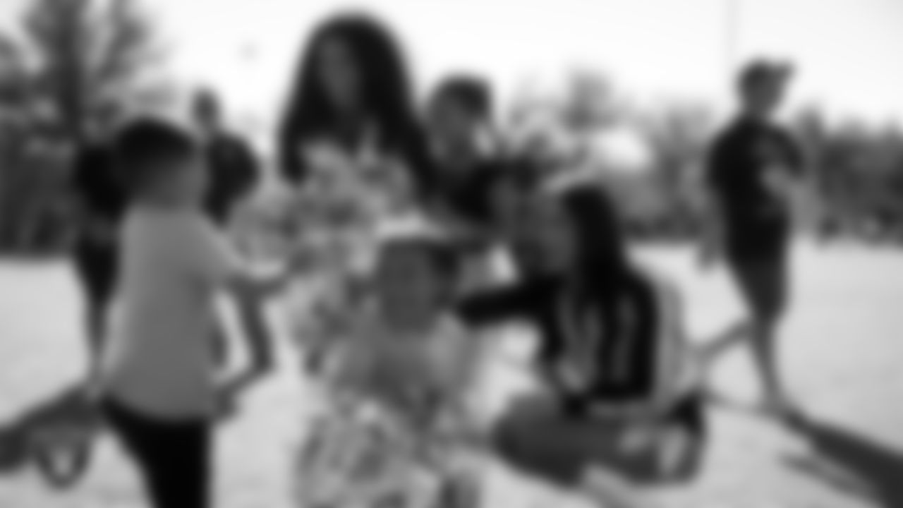 Raiderettes Shayla and Meekela with fans during the 2025 NFL FLAG Regional Tournament at Heritage Park.