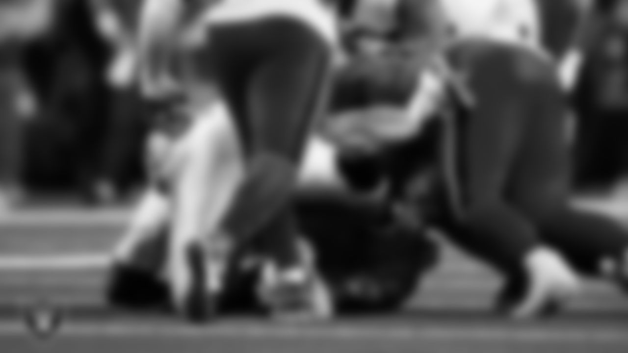 Las Vegas Raiders defensive tackle Adam Butler (69) makes a tackle during the regular season away game against the Houston Texans at NRG Stadium.