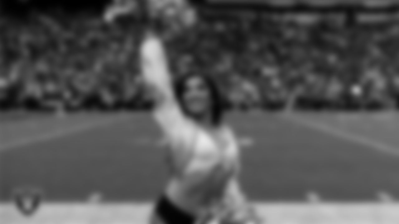 Raiderette Tatiana on the sidelines during the regular season home game against the Denver Broncos at Allegiant Stadium.