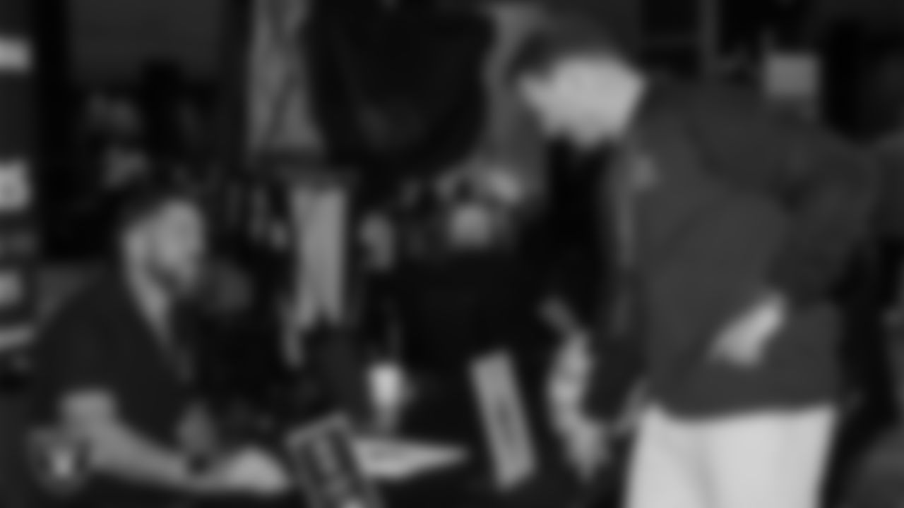 Las Vegas Raiders alumnus Robert Gallery speaks with a high school football coach during a Glazier Clinic at Grand Sierra Resort.