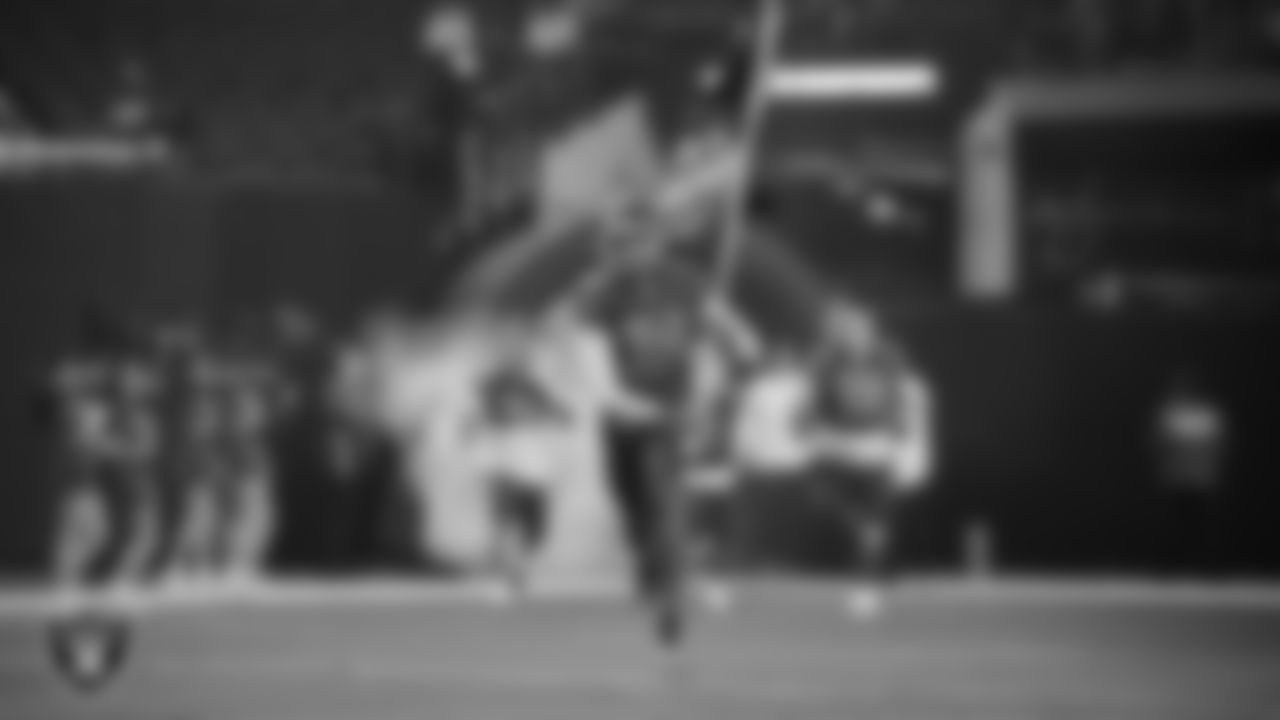 The Arbor View High School football team takes the field before the NIAA 5A Open Division State Championship game against Bishop Gorman High School at Allegiant Stadium.