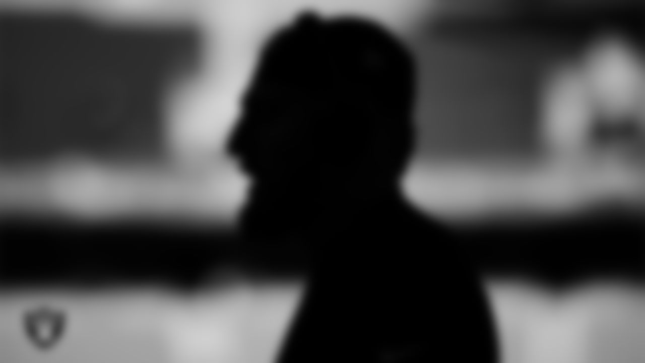 Las Vegas Raiders defensive end Maxx Crosby (98) warming up before the regular season away game against the Kansas City Chiefs at GEHA Field at Arrowhead Stadium.