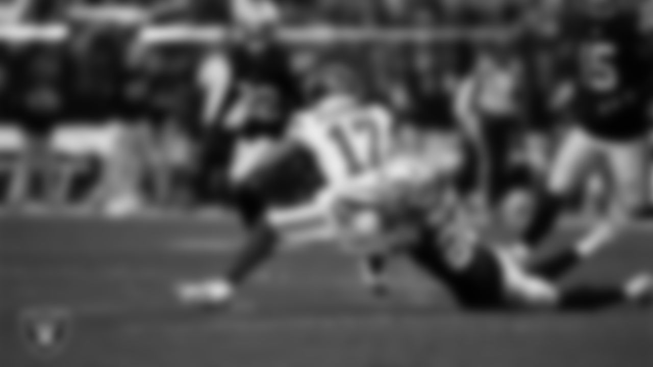 Las Vegas Raiders safety Isaiah Pola-Mao (20) makes a tackle during the regular season home game against the New York Giants at Allegiant Stadium.