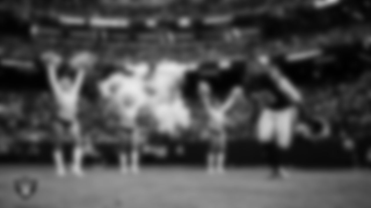 Las Vegas Raiders defensive tackle Thomas Booker IV (99) is introduced onto the field before the regular season home game against the Kansas City Chiefs at Allegiant Stadium.