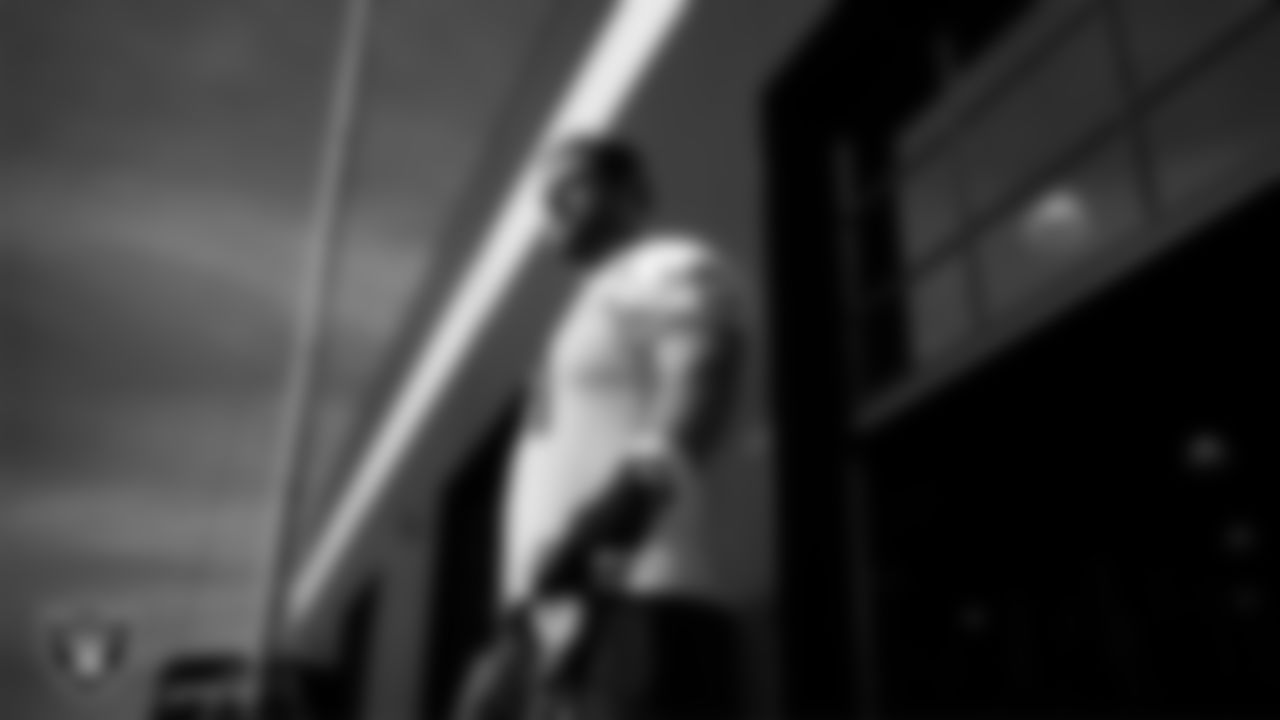 Las Vegas Raiders center/guard Jordan Meredith (61) walks out to the field for practice at Intermountain Health Performance Center.