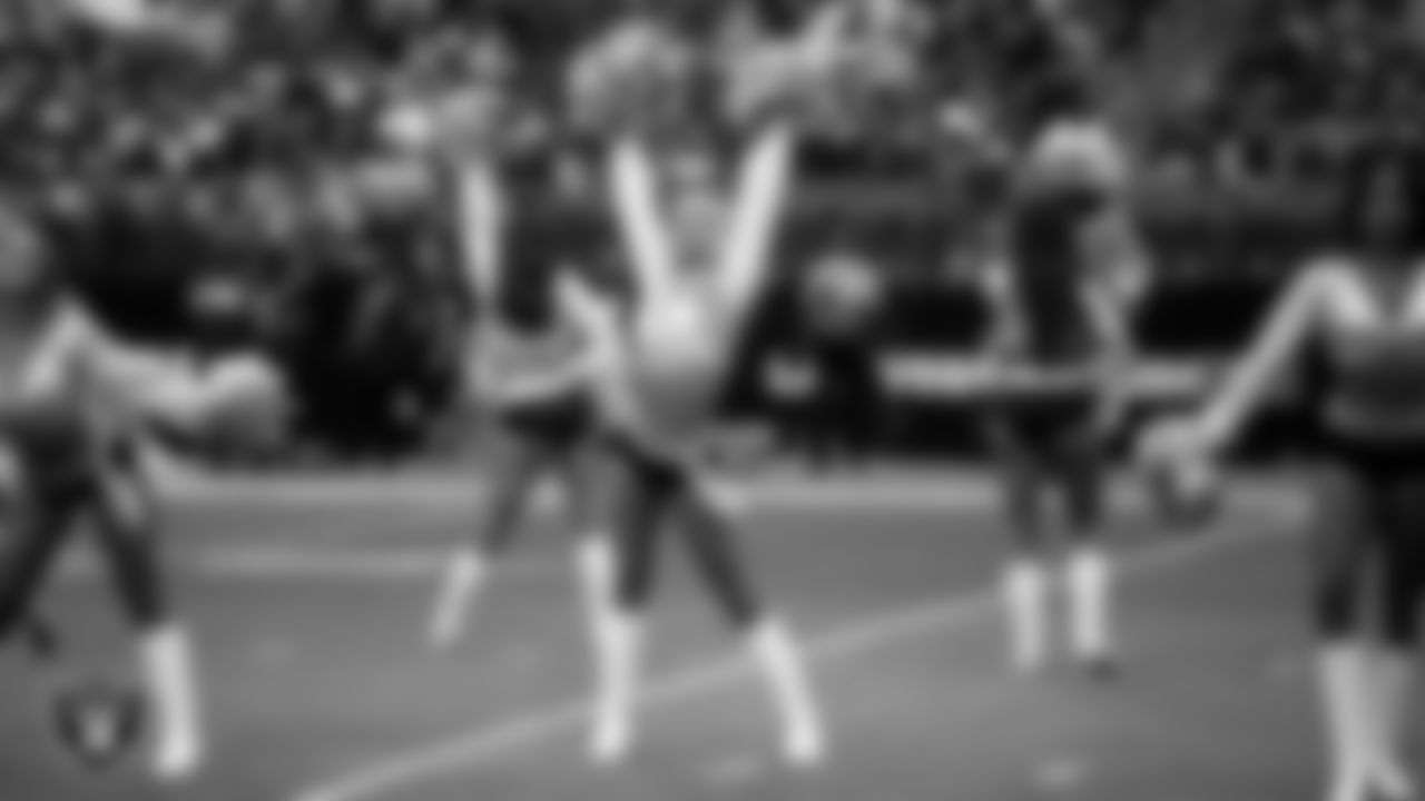 Raiderette Delaney during player introductions before the preseason home game against the San Francisco 49ers at Allegiant Stadium.