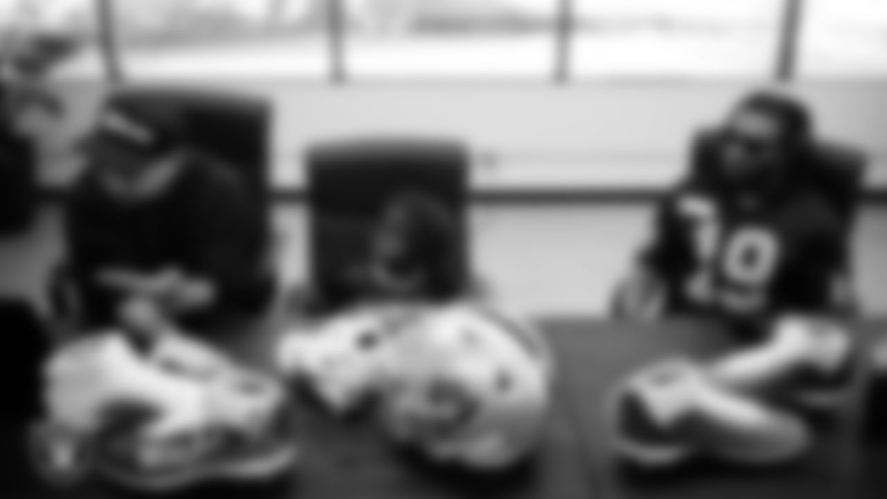 Las Vegas Raiders wide receiver DJ Turner (19) meets with representatives from the Raiders Silver & Black Flag Football league to design cleats for My Cause My Cleats at Shoe Palace Corporate Offices.