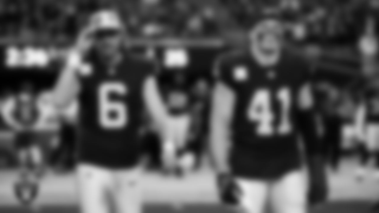 Las Vegas Raiders punter AJ Cole (6) and linebacker Robert Spillane (41) walk out to the center of the field for the coin toss before the regular season home game against the the New York Giants at Allegiant Stadium.