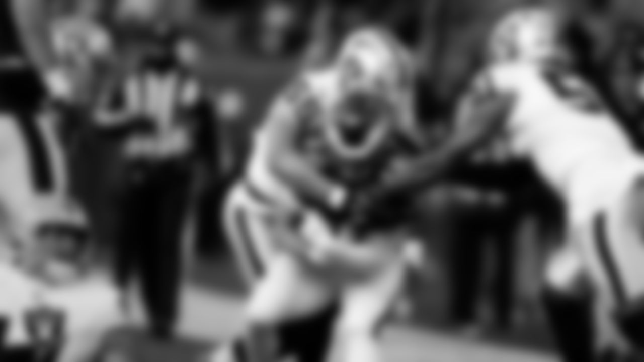 Las Vegas Raiders linebacker Cody Lindenberg (55) and defensive end Malcolm Koonce (51) make a tackle during the regular season away game against the Philadelphia Eagles at Lincoln Financial Field.