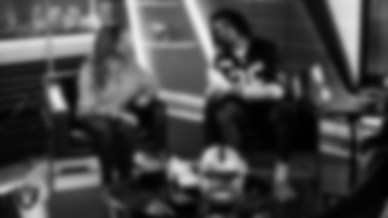 Las Vegas Raiders cornerback Darien Porter (26) works with representatives from The Shade Tree and designers to design cleats for My Cause My Cleats in Cox Studios at Intermountain Health Performance Center.