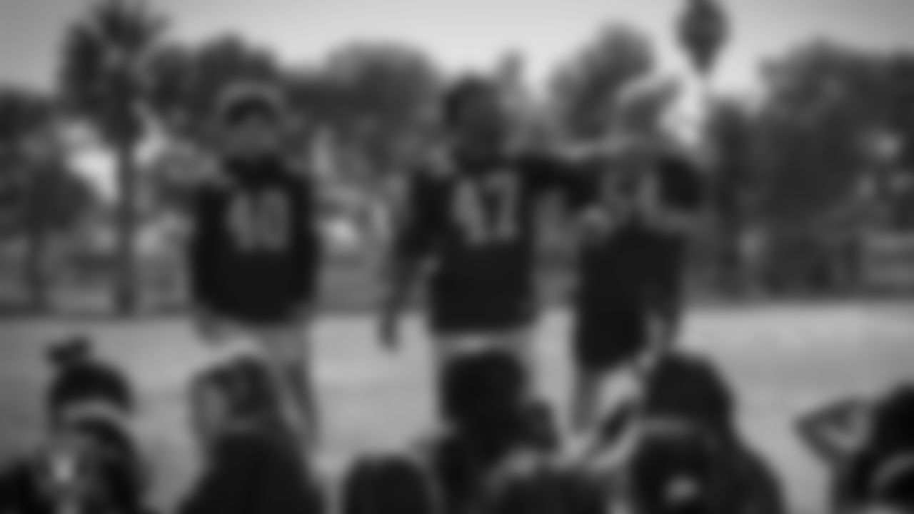 Las Vegas Raiders running back Sincere McCormick (47) speaks to students during the Stretch & Move Program and NFL Play 60 initiative at Jack Dailey Elementary School.