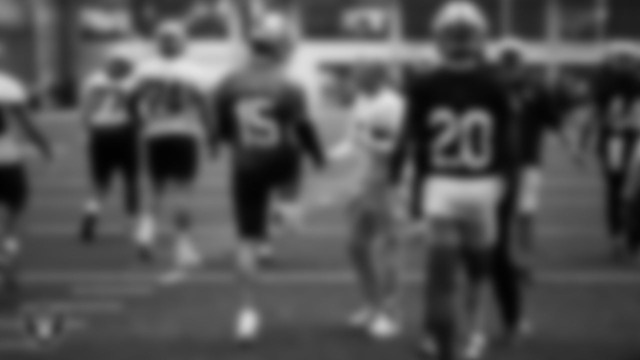 Las Vegas Raiders quarterback Kenny Pickett (15) and Head Coach Pete Carroll during practice at Intermountain Health Performance Center.