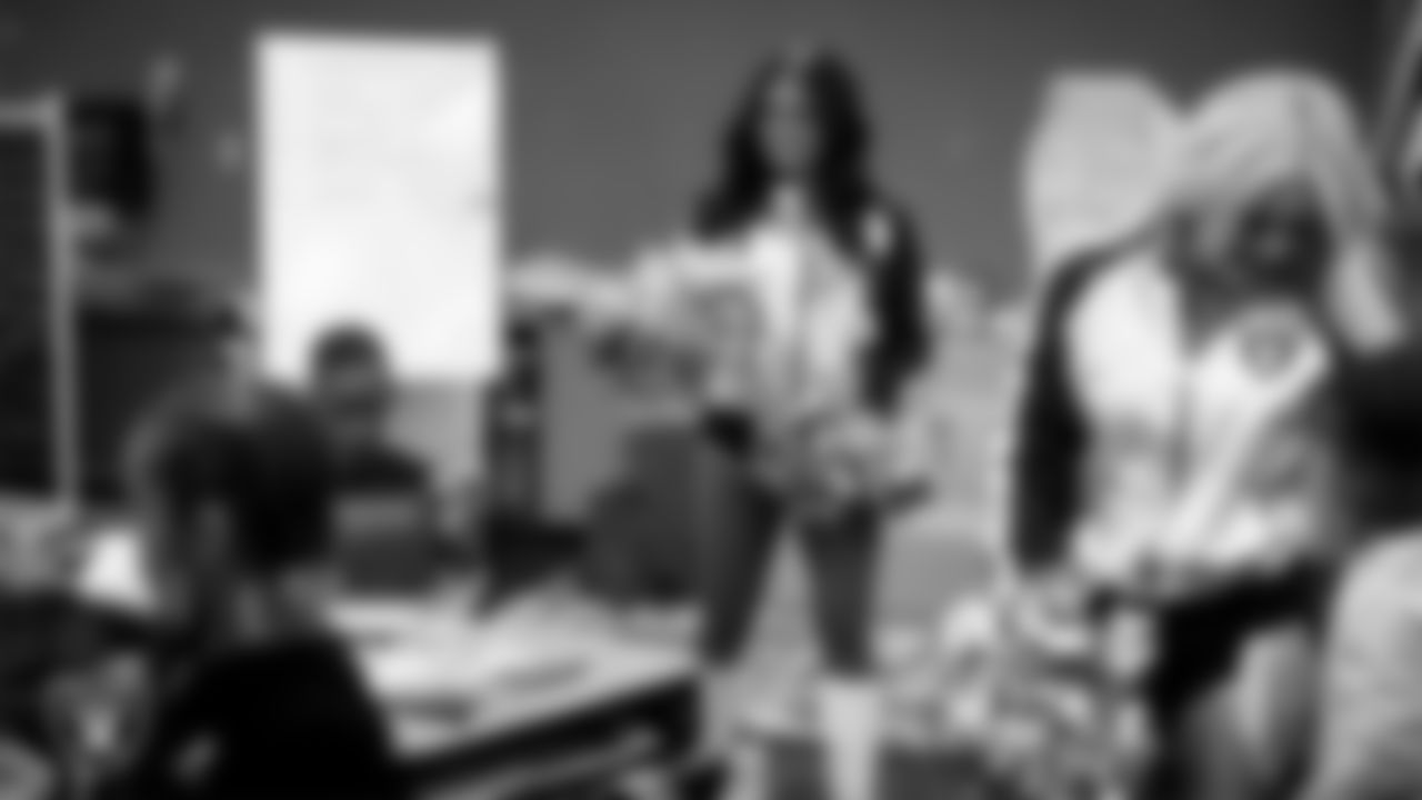 Raiderette Sloane visits a classroom during a 'Lil Raiders Pop-Up at Matt Kelly Elementary School.