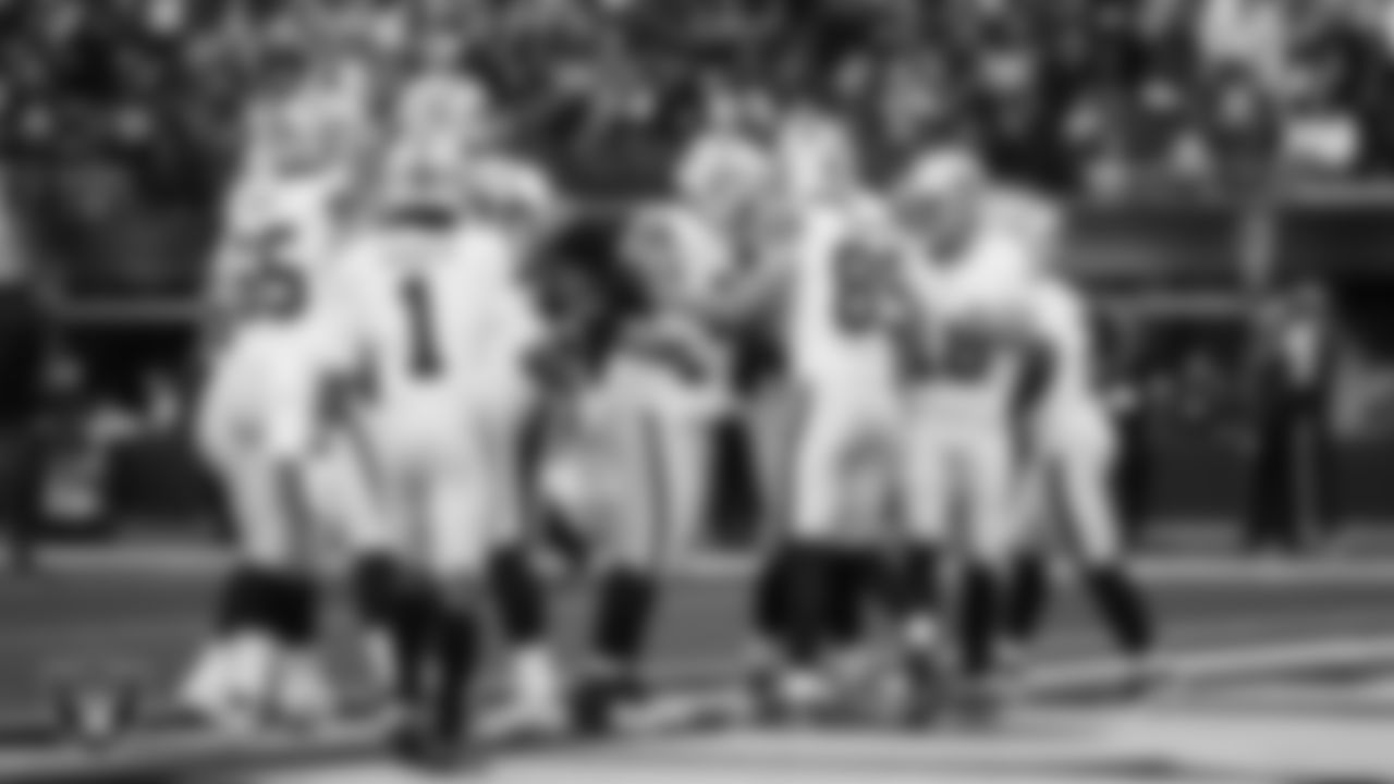Las Vegas Raiders tight end Brock Bowers (89) celebrates with teammates after making a 6-yard touchdown catch during the regular season away game against the Los Angeles Chargers at SoFi Stadium.
