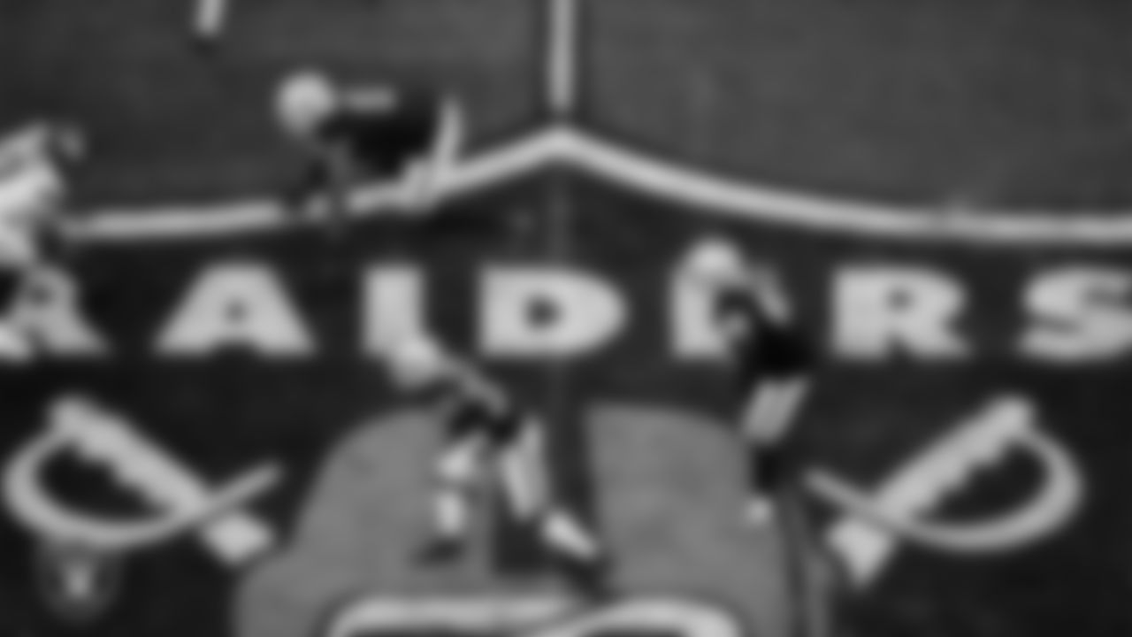 Las Vegas Raiders defensive end Tyree Wilson (9), linebacker Jamal Adams (33) and linebacker Devin White (45) line up before the snap during the regular season home game against the Denver Broncos at Allegiant Stadium.