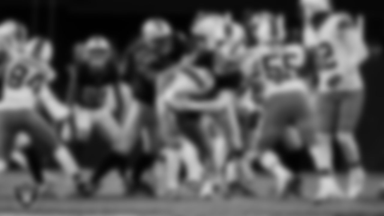 Las Vegas Raiders defensive end Maxx Crosby (98) makes a tackle during the regular season home game against the Cleveland Browns at Allegiant Stadium.