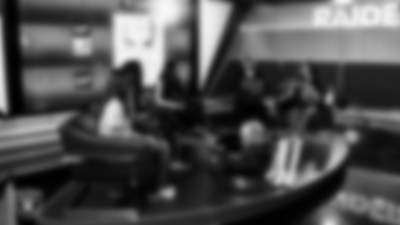 Raiderettes Shayla and Kylee meet with representatives from Hope Means Nevada and designers to design custom boots for the NFL's My Cause My Cleats initiative in Cox Studios at Intermountain Health Performance Center.