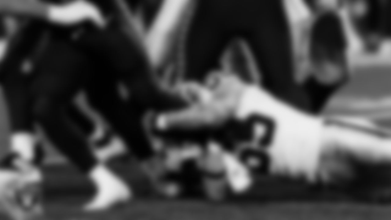 Las Vegas Raiders linebacker Cody Lindenberg (55) makes a tackle during the preseason away game against the Seattle Seahawks at Lumen Field.