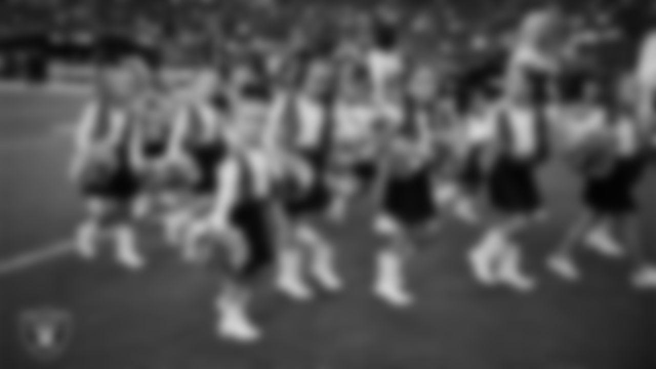 Junior Raiderettes exit the field after their performance before the preseason home game against the San Francisco 49ers at Allegiant Stadium.