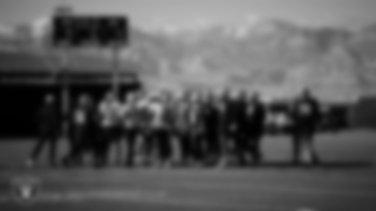 The Las Vegas Raiders huddle during practice at Intermountain Health Performance Center.