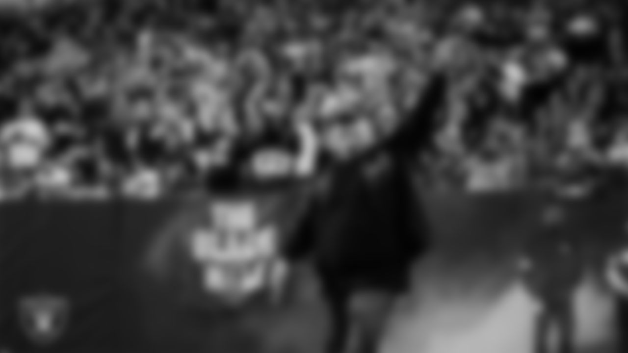 United States Marine Corps Veteran Raymond Warren III is honored during a Salute to Service moment during the regular season home game against the Dallas Cowboys at Allegiant Stadium.