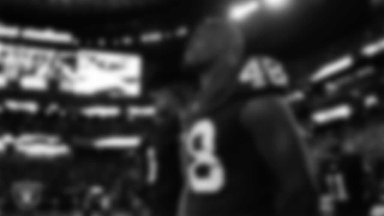 Las Vegas Raiders linebacker Jamin Davis (48) during the national anthem before the regular season home game against the Dallas Cowboys at Allegiant Stadium.