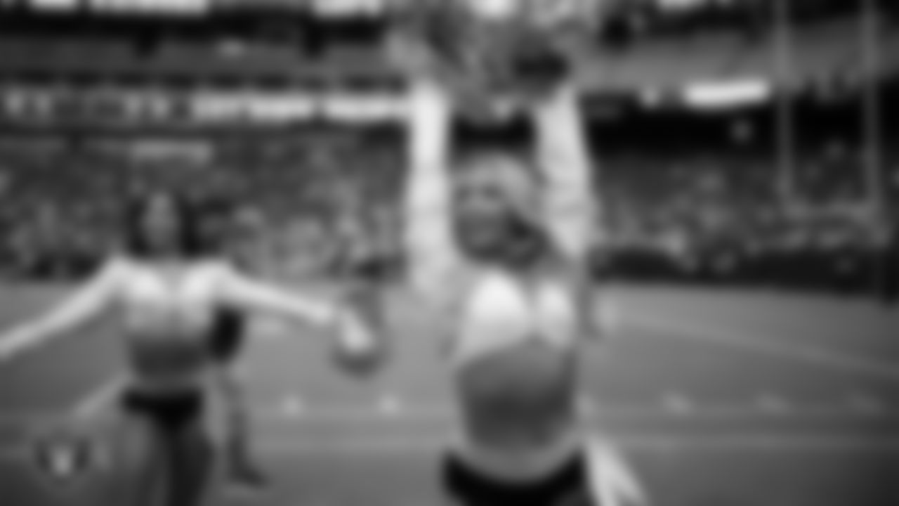 Raiderette Devyn on the sidelines during a 2025 Training Camp mock game at Allegiant Stadium.