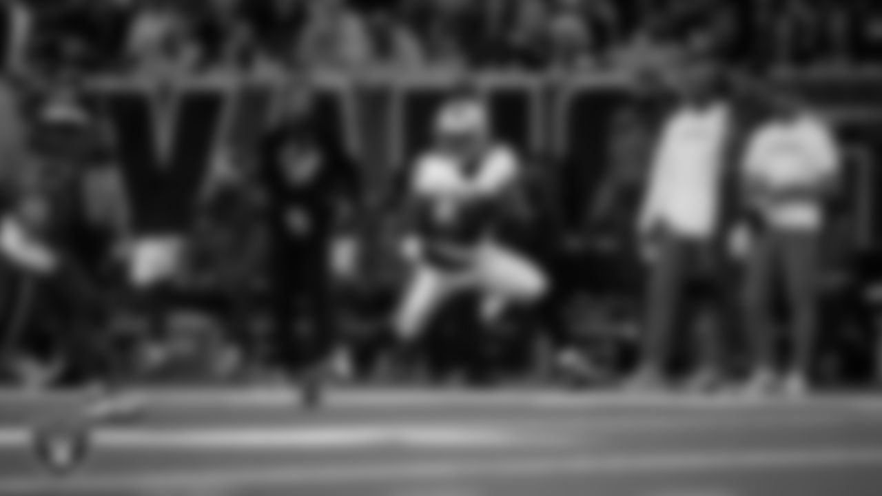 Las Vegas Raiders running back Ashton Jeanty (2) runs after making a 60-yard touchdown catch during the regular season away game against the Houston Texans at NRG Stadium.