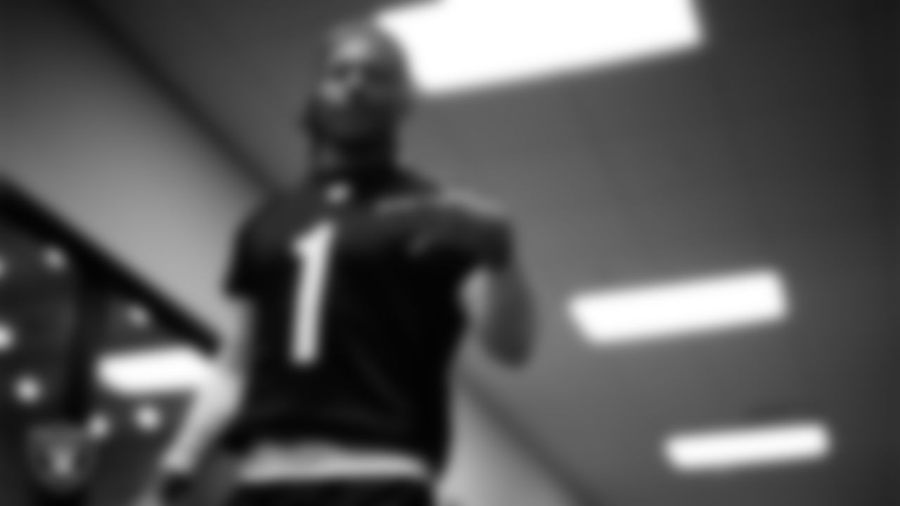 Las Vegas Raiders wide receiver Tre Tucker (1) walks out to the field for practice at Intermountain Health Performance Center.