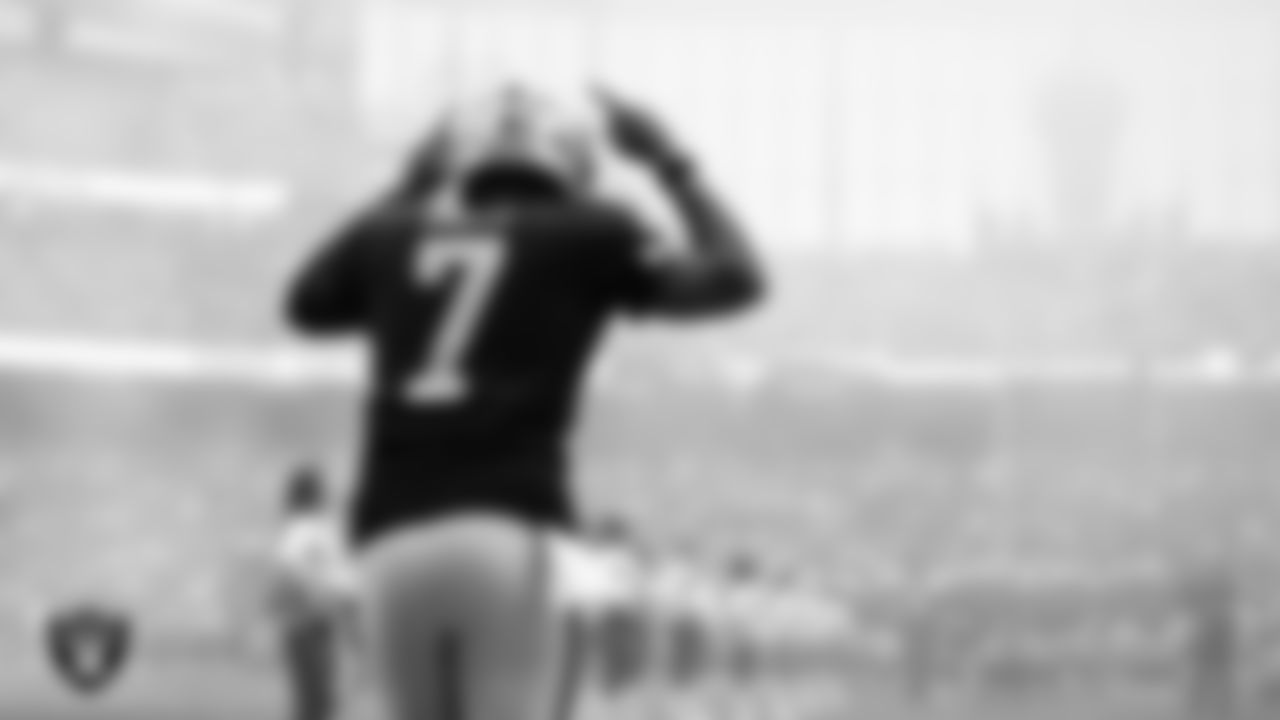 Las Vegas Raiders quarterback Geno Smith (7) is introduced onto the field before the preseason home game against the San Francisco 49ers at Allegiant Stadium.