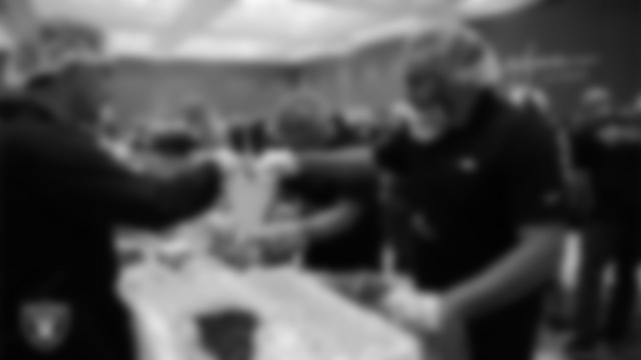 Volunteers pack meals during a Feed the Funnel Party at Wynn Las Vegas.