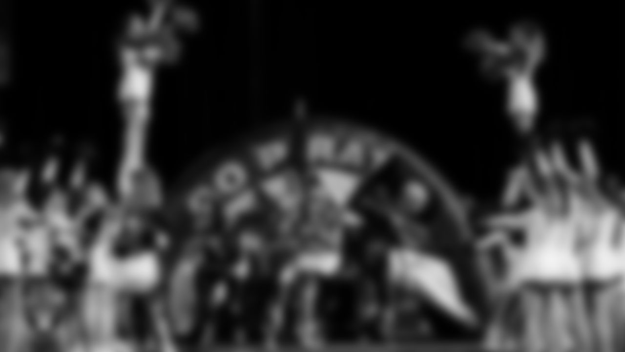 The Moapa Valley High School football team takes the field before the Las Vegas Raiders' Football Showcase game at Moapa Valley High School.